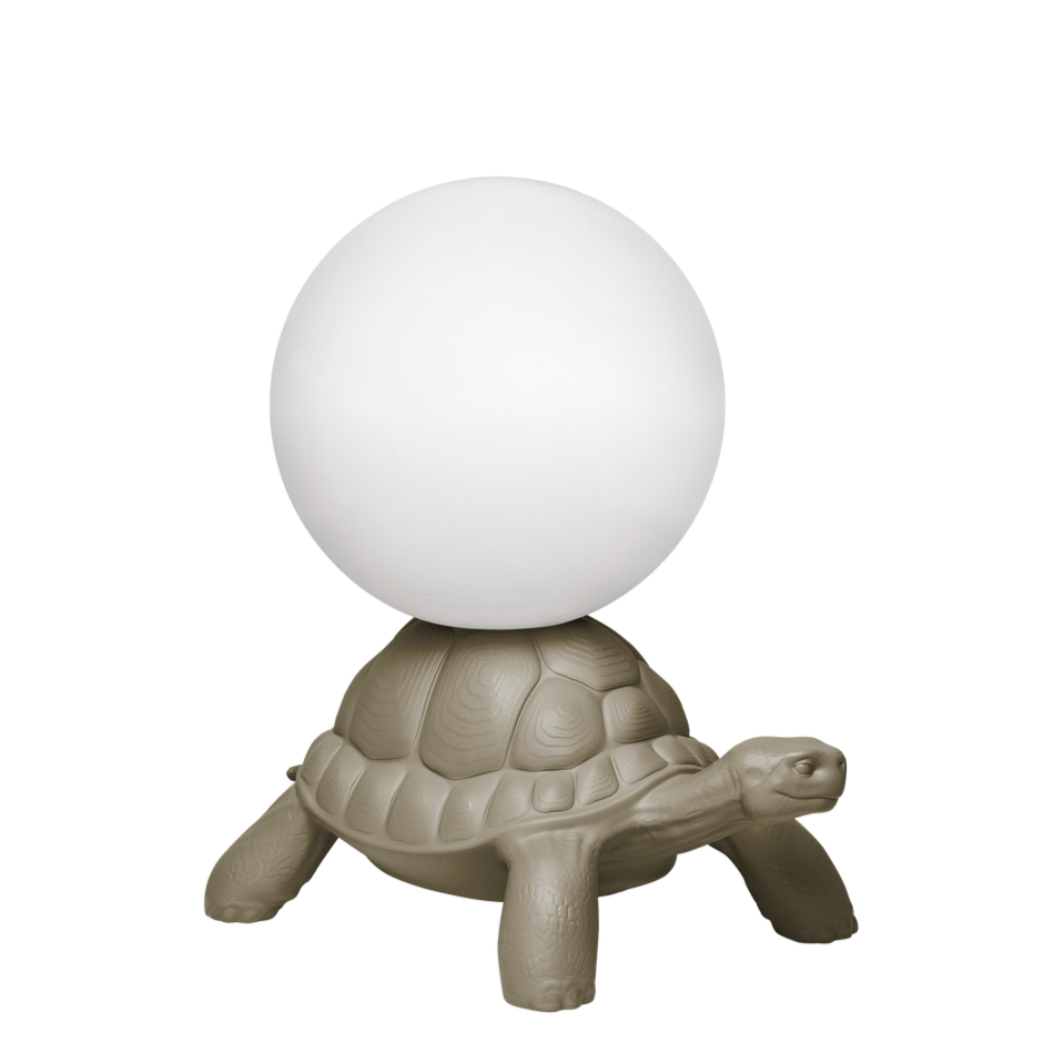 Turtle Carry lamp enters your home, carrying a glowing ball on his armor. The turtle carry lamp, designed by Marcantonio, will illuminate every corner of your apartment, without effort to create the "wow" effect and adding a stunning accent to the decor of your home or space outside.