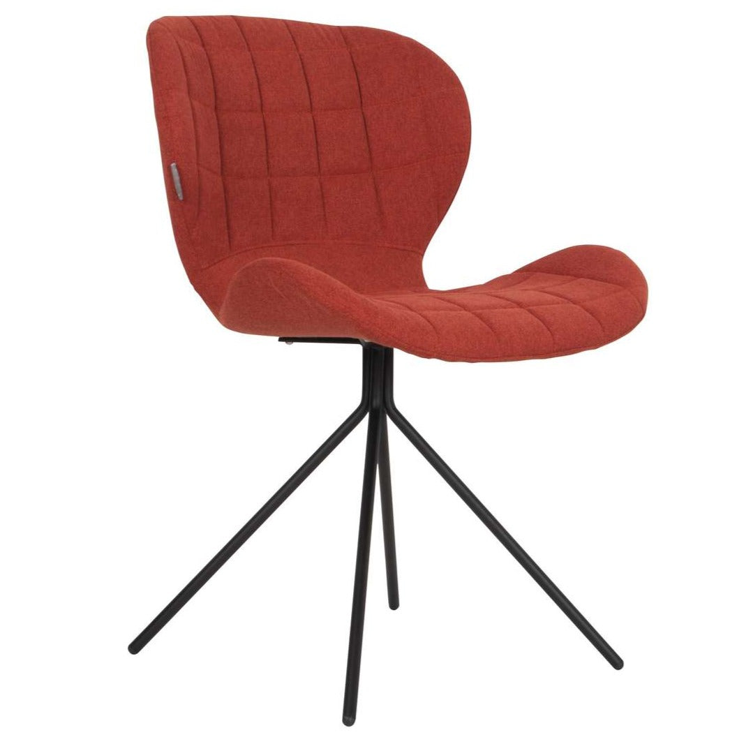 OMG is a modern armchair with character that impresses with its shape. Eye -catching seat, covered with durable, polyester fabric, decorate the piercing in diamonds. Both the seat and support have been profiled so as to ensure comfort even for long work. The whole is maintained by a metal frame, which consists of four black legs converging inside.