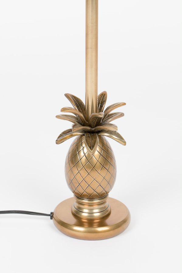 Hold the feeling of a tropical vacation (without having to buy an air ticket) thanks to the Bold Monkey Juicy Pineapple table lamp. Drawing the inspiration from the fruit of the same name, this table lamp will certainly bring an exotic breeze to every surface on which it will be found. The brass finish gives a stylish accent to this funny style. The small size of this juicy pineapple table lamp by Bold Monkey makes it perfect for a side table or shelf - just not for the fridge.
