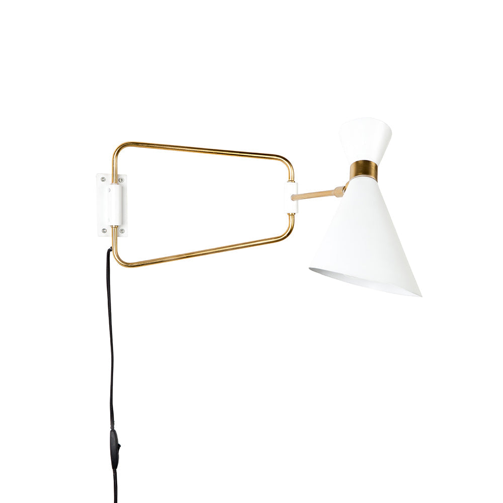Shady's wall lamp is something timeless, which will always be on time and fashion. The asymmetrical lampshade accosted on straight metal shoulders was completed with brass details. Thanks to its elegance, it fits perfectly into a modern living room and hallway, giving a pleasant light falling on the wall or on a favorite picture.