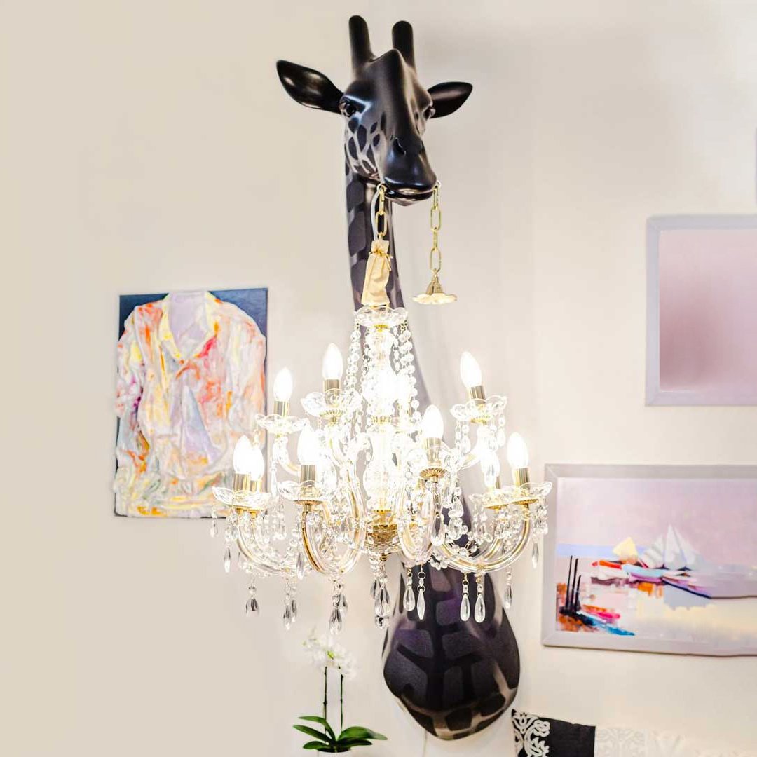 The phenomenal wall lamp, designed by Marcantonio, which will enliven every living room, bedroom or elegant restaurant in an unusual way. The majestic giraffe holds a chandelier in the style of Maria Teresa in a miniature version. This is the perfect combination of good design with functionality.