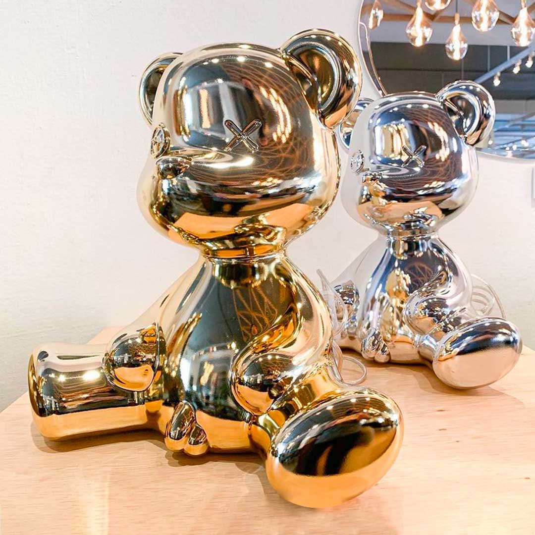 Teddy Boy is an unconventional lamp, designed by Stefano Giovannoni like the original teddy bear. It combines the features of a plush with "almost human" physiognomy. In a playful way, he embodies the memory of a childhood toy. It has a special, metallic coating that does not interfere with the emitted light.