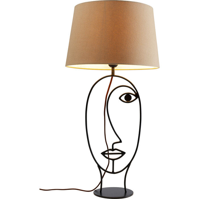An unusual table lamp with a portrait of a lady as a basis and a bronze lampshade in shades of cappucino, gives each interior its own face in the real sense of the word. Regardless of whether it is placed in a modern living room, bedroom or hallway, a large table lamp is always impressive.