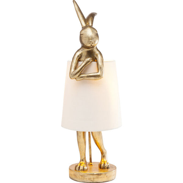A bunny table lamp is a real collector's item with a large heart. The elegant golden look fits into a modern living room, thanks to its charm placed on a bedside table in a vintage bedroom, it will take care of sweet dreams. It emits a warm dispersed light, which allows it to insulate the dining room retro when it is on the dresser.