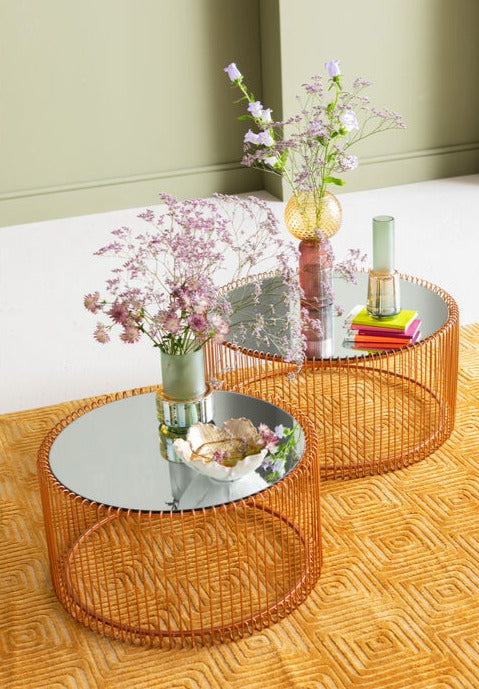 A set of WIRE copper coffee tables