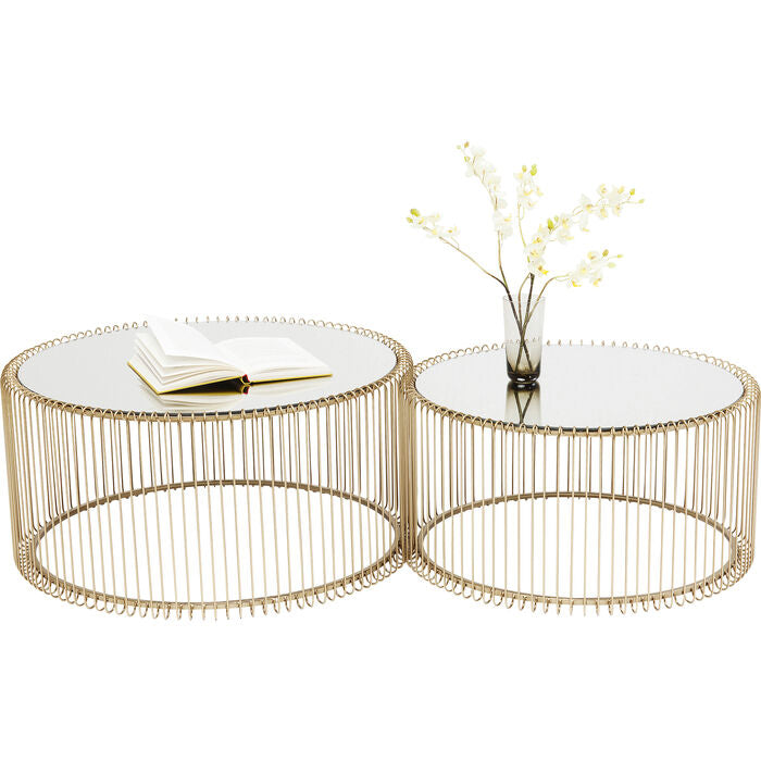 A set of WIRE gold coffee tables