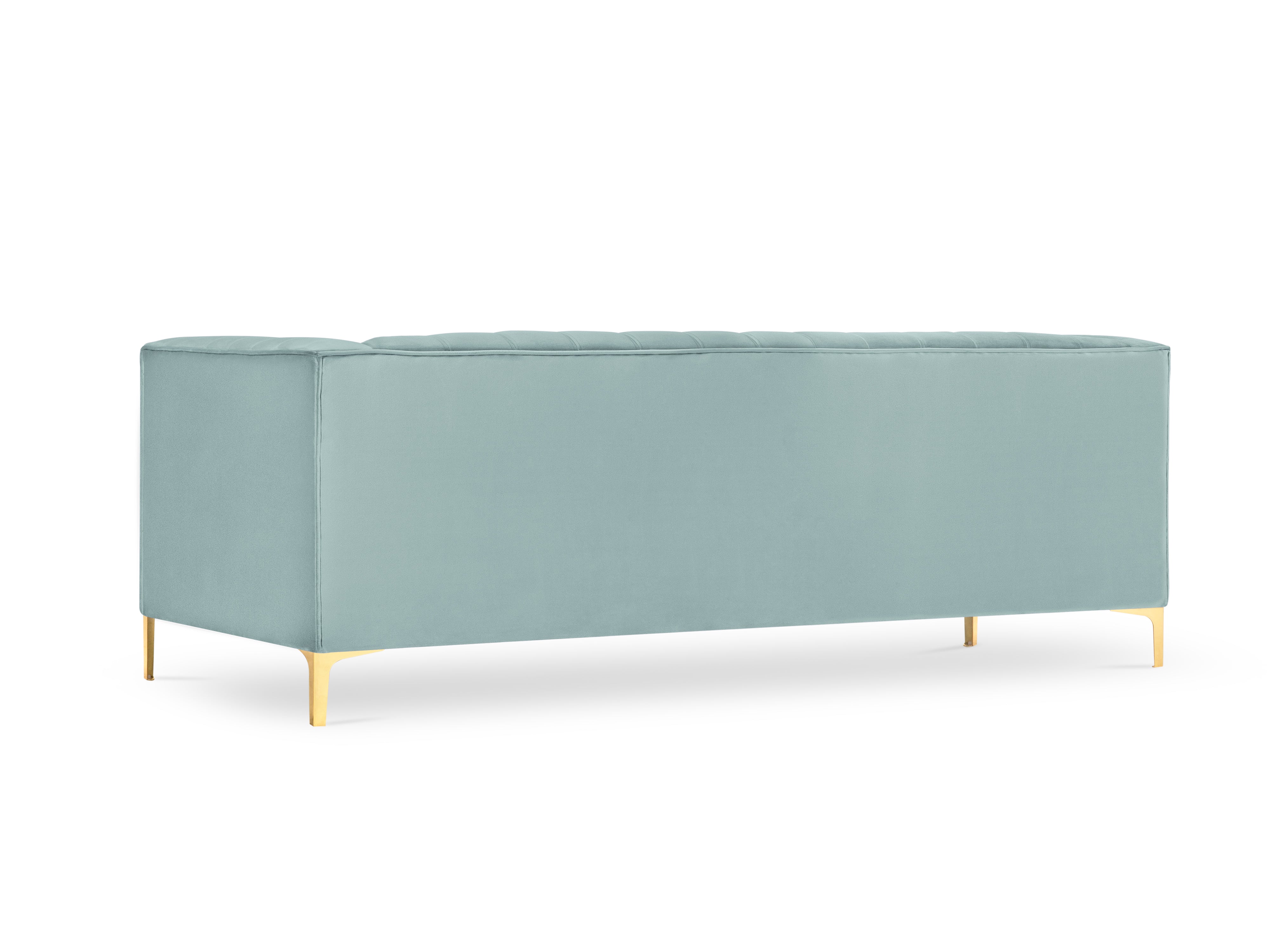 mint sofa with a golden base