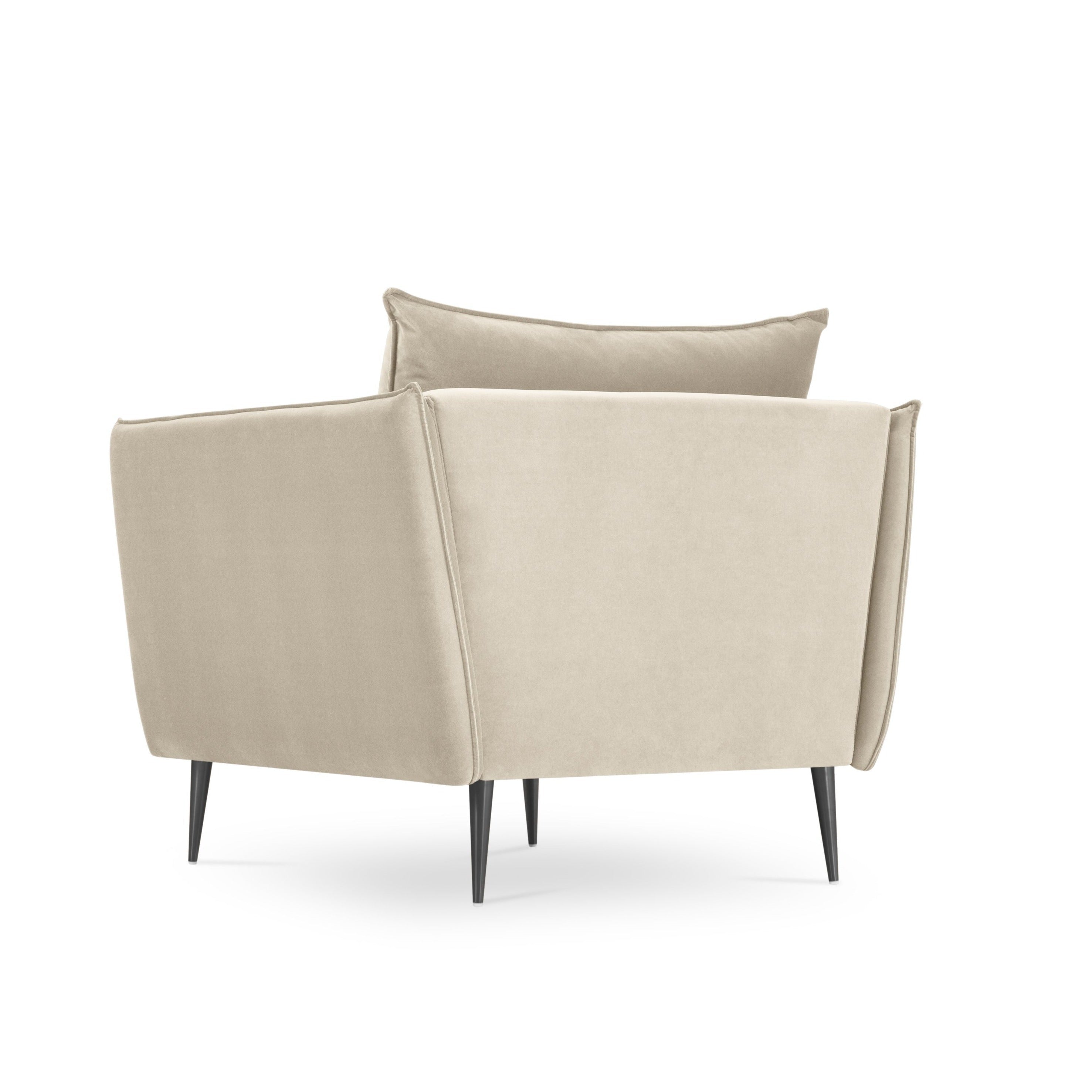 beige armchair with a black base