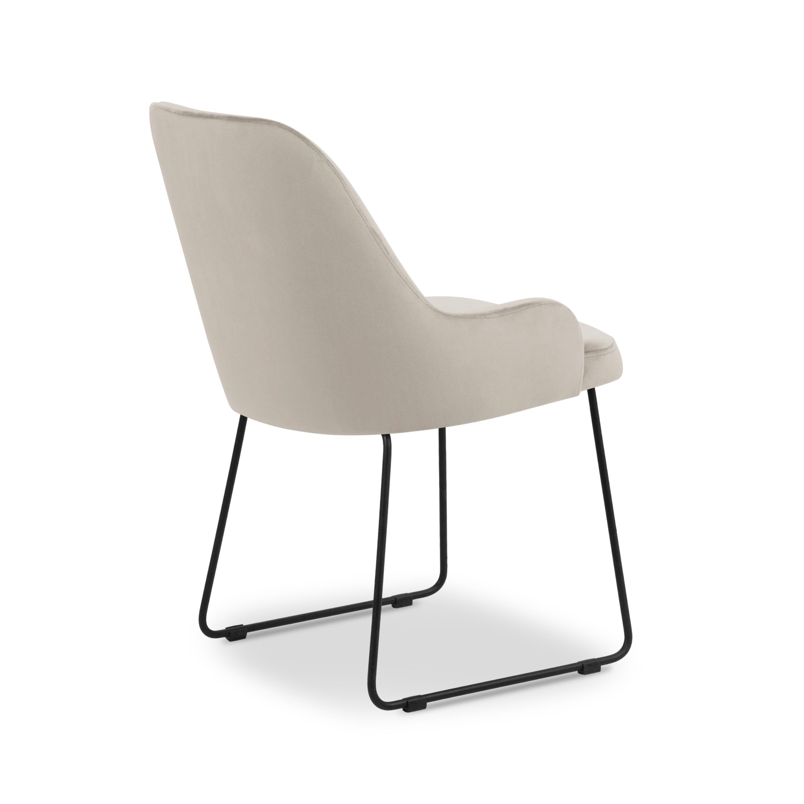 Beige chair with a black base