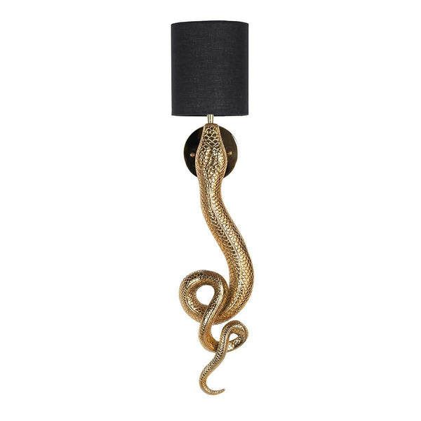 Daine Złoty wall lamp with a black lampshade is a unique proposal to revive any space. A snake -shaped wall lamp, with a precise golden finish of each scale, is characterized by exotic, and a simple black lampshade adds elegance. Daine is great in the living room, bedroom as well as in the office space.