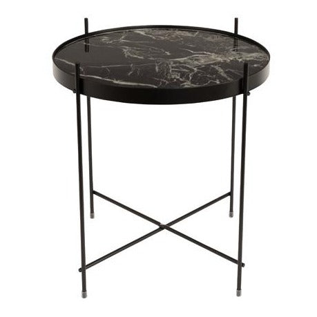 The Cupid table is versatile in terms of style, decoration options and general use. It owes this thanks to its simple shapes, through which it works in both a modern, Scandinavian and minimalist living room. A metal frame painted with a powder method for color that maintains a marble top. To protect it against damage and dirt, tempered glass was laid on top.