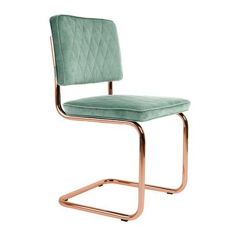 Diamond is a chair that, thanks to the shiny copper support frame and rich fabric, is so elegant that you will not only sit on it, but "you will blend in on it." The added stitch in diamonds makes this armchair achieve visual perfection! Does the classic dining room call for this chair in it? Each household member will want to eat shared meals, even the spirit of the interior vintage will like this furniture!