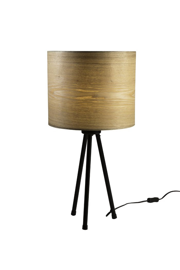 The Woodland table lamp is a retro style in a completely new version. The lamp has a lampshade with a classic, simple, regular shape. The lampshade was made of ash veneer, which distracts the light and spreads a warm and pleasant atmosphere. Veneer is flexible enough and can be formed in such calm and regular shapes.
