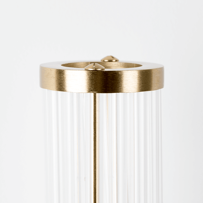 Modern acrylic design tubes are complemented by a matte brass wall finish. Thanks to our fashionable Angel On Fire wall lamp, you can softly and stylishly illuminate the wall in the gallery or add the glow of empty wall space. Style that