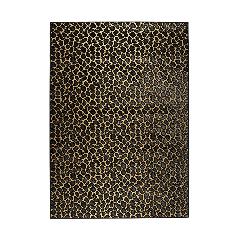 The Bold Monkey Ame's A Wild World Baby Panther rug is a simple way to change the character of the room. It is a vocal point for minimalist interiors or a fun sparring partner for each room that is not afraid of a collision of prints.